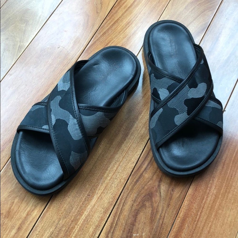 BARNEYS slip-on sandals.